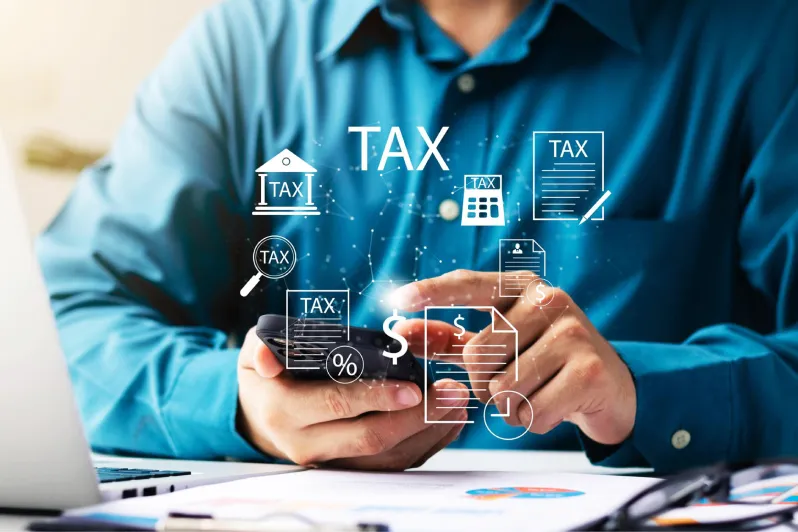 Businesses in UAE preparing financial reports for corporate tax compliance